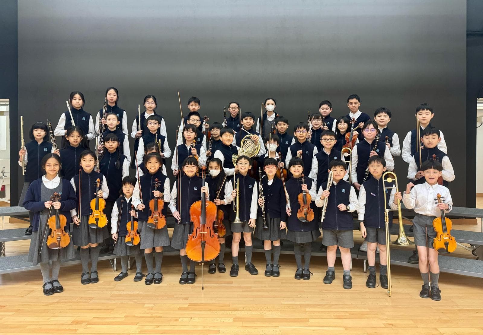 北角衞理小學 北衞管弦樂團努力練習,在聯校音樂大賽(小學組)2025榮獲銀獎,可喜可賀!